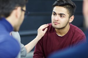 man during a session of rational emotive behavioral therapy or REBT