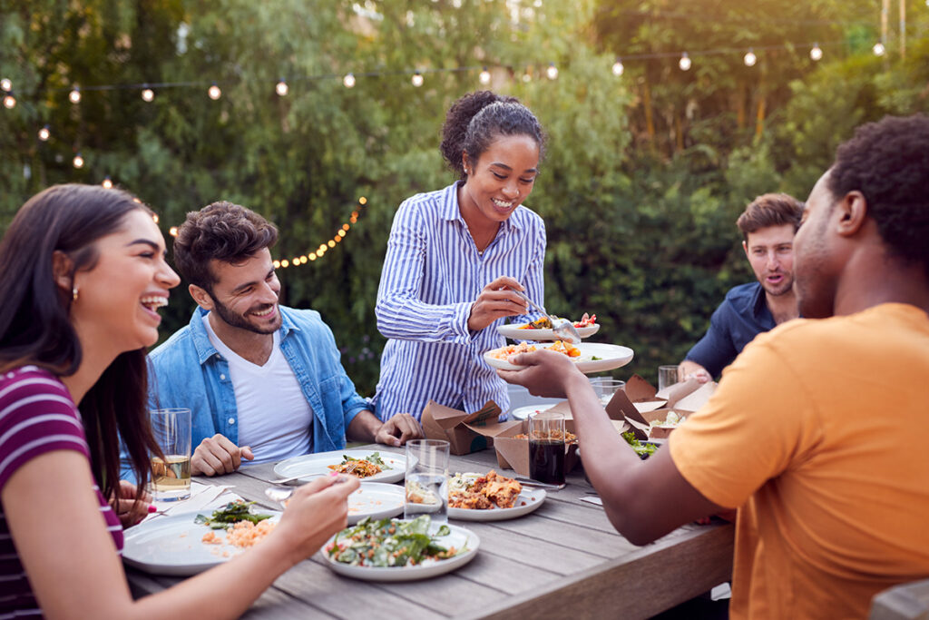 a group of friends have a picnic, which can be a drinking trigger
