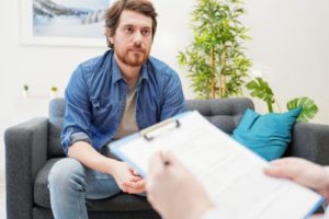 a man talks to a therapist at a cocaine addiction treatment program in north carolina