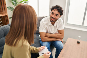 a therapist talks to a person in personality disorder treatment 