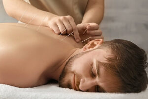 man experiencing how acupuncture and addiction treatment connect