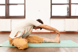 individual experiencing the benefits of yoga for men