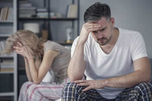 man and woman struggling with the connection between drug addiction and relationships