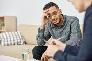 man debating if he should participate in mental health counseling in Myers Park NC