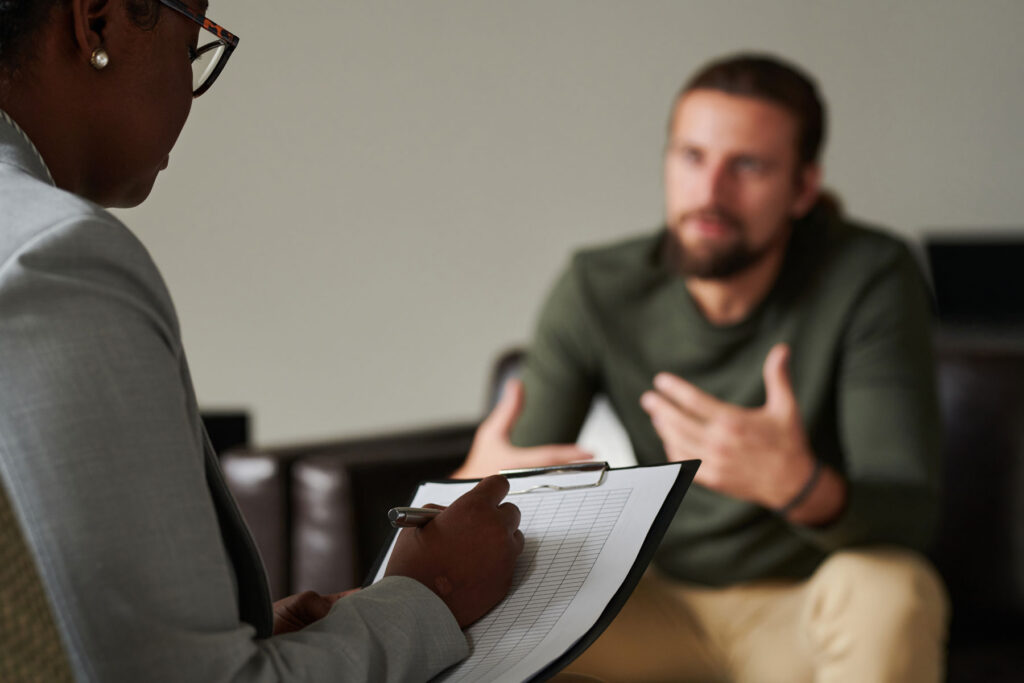 a client talks with a therapist about borderline personality disorder in men