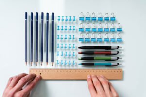 a person uses a ruler to straighten groups of things, which can be a sign of one of the types of ocd