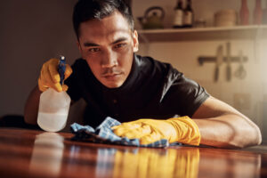 a man cleans but thinks about the best medication for ocd